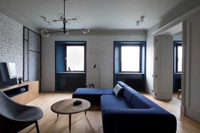 blue slopes in a white loft living room