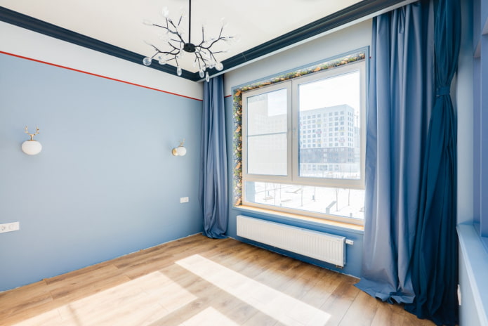variegated wallpaper on slopes in a blue room