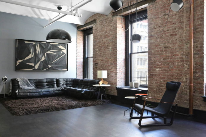 raw brick walls and slopes in the loft living room