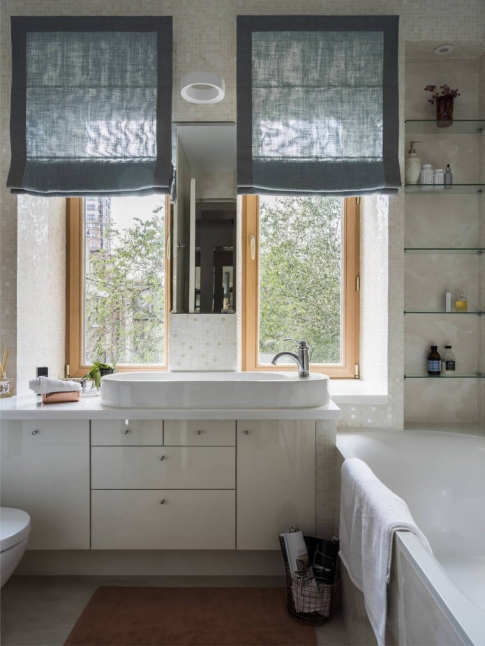 beige mosaic on slopes in the bathroom