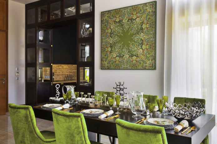 painting and chairs in olive tones