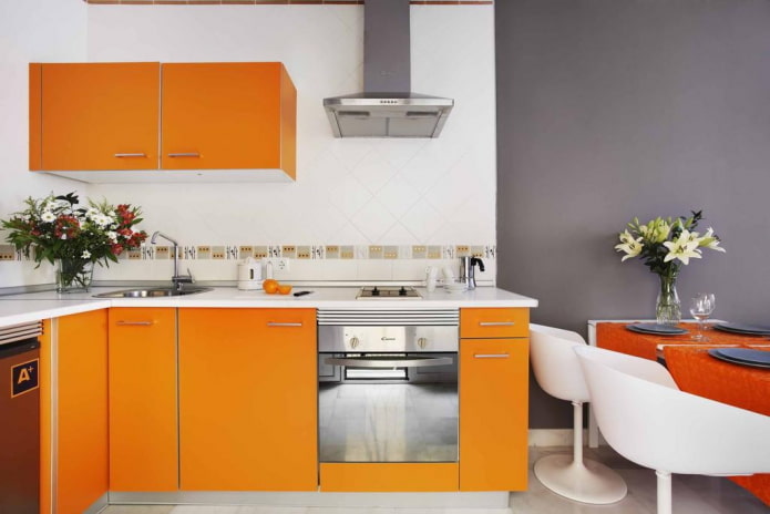 decor in the kitchen interior in orange tones