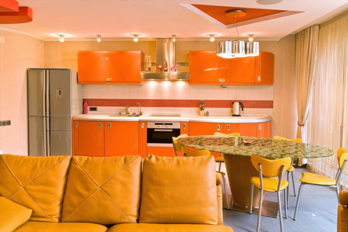 kitchen-living room interior design in orange tones