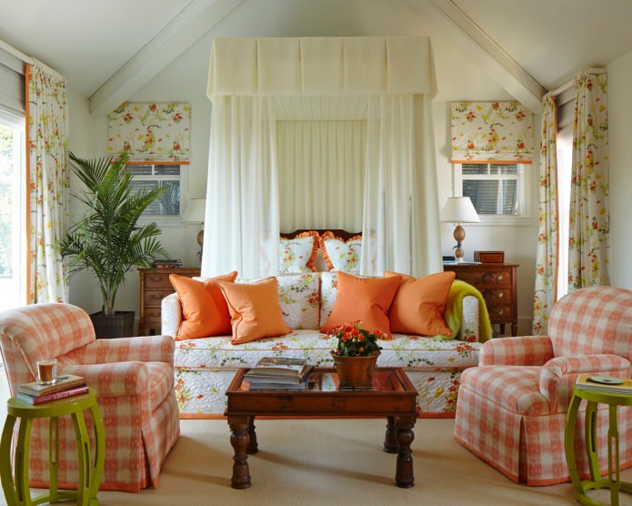 Country living room with orange textiles in a flower