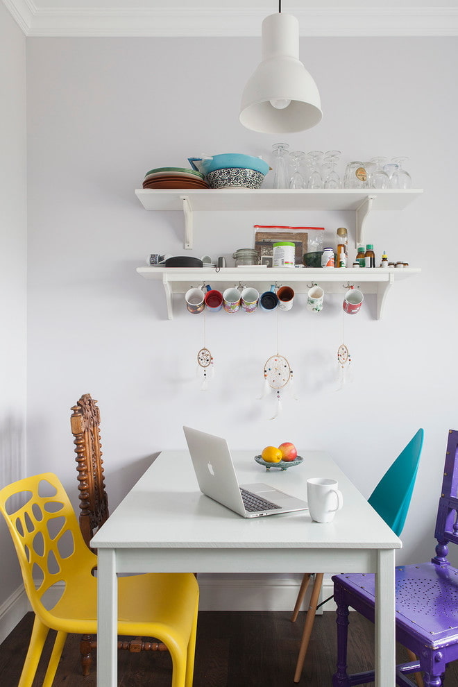 Two shelves above the table