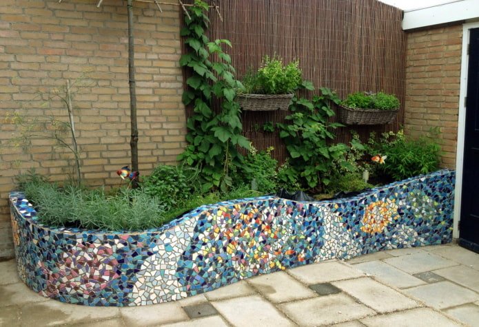 Flowerbed decor with broken tiles