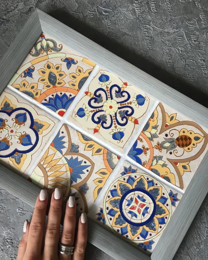 Painted tile in a frame