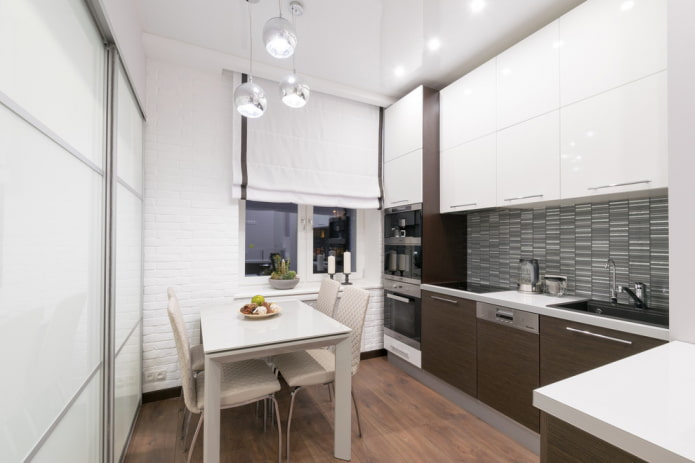 lighting of a stretch ceiling in the interior of a small kitchen