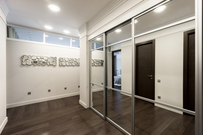 lighting in the interior of an L-shaped hallway