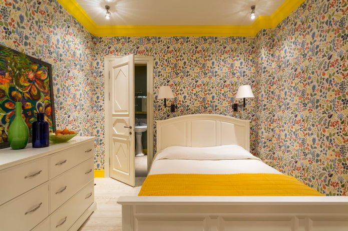 Small bedroom with sconces and spotlights