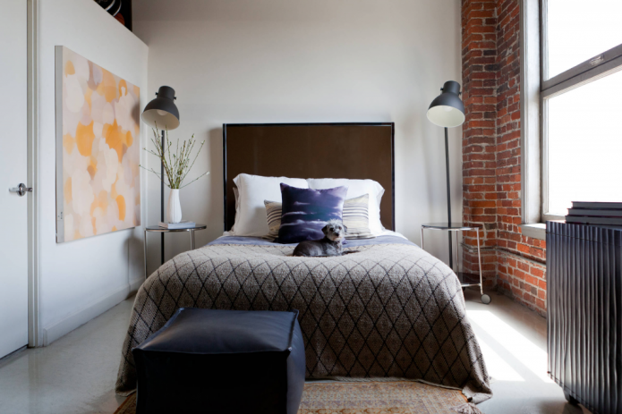 Floor lamps in a loft-style bedroom