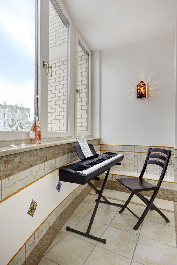 Strips of tiles and stone on the balcony