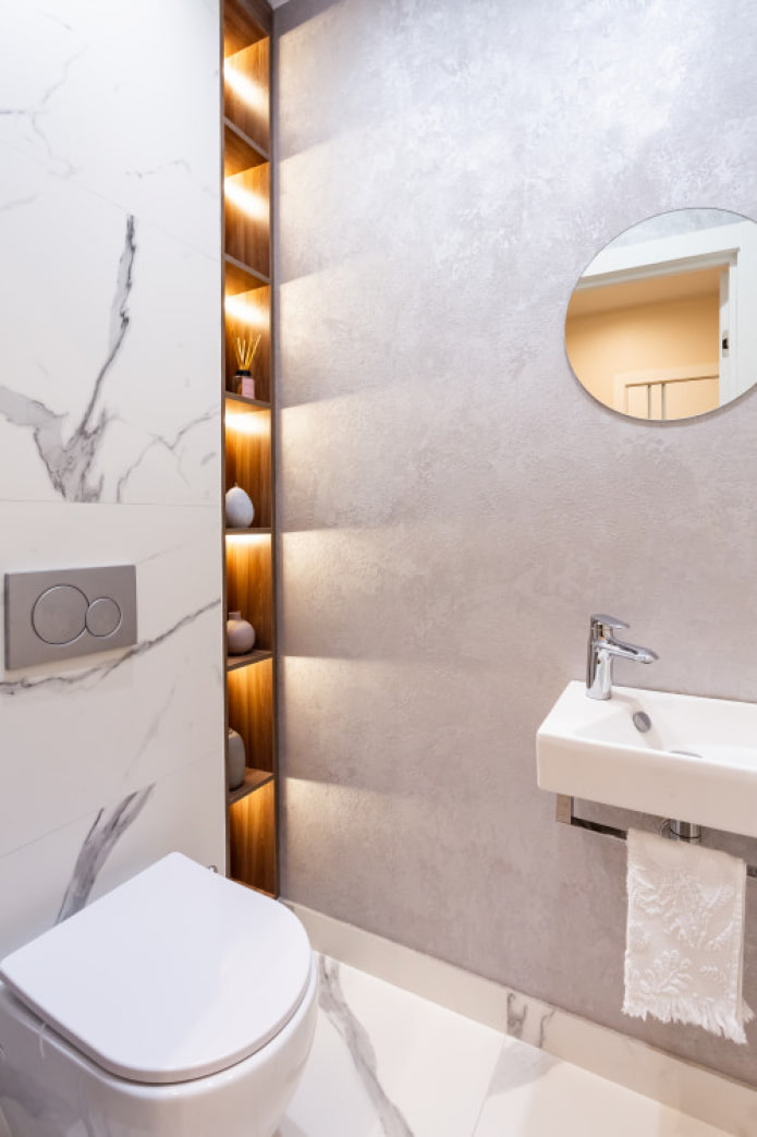 shelves in a niche in the toilet
