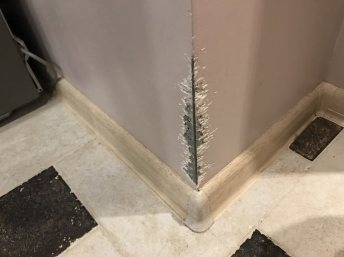 damaged corner in the hallway