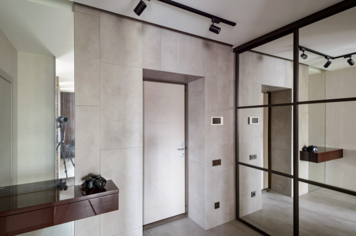 finishing the walls with tiles in the hallway