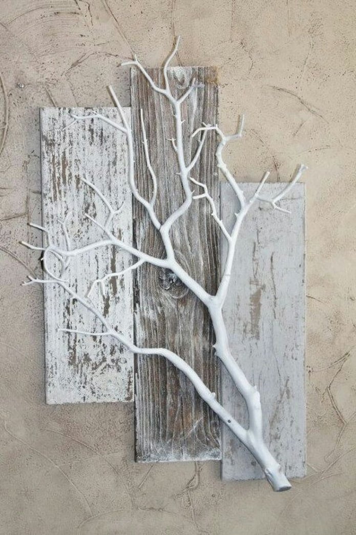 panel of tree branches on the wall in the interior