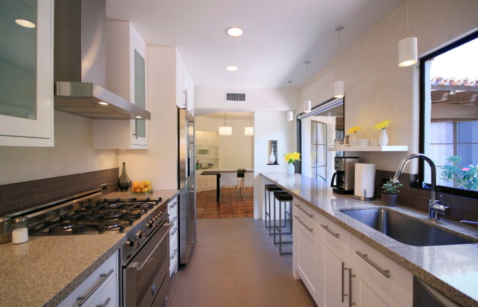 narrow kitchen with a bar counter
