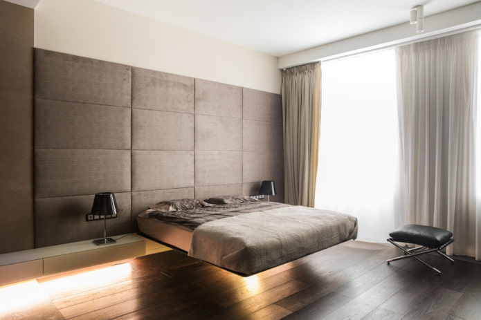 bed with a soft headboard