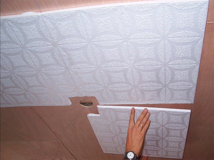 sticking polystyrene tiles to the ceiling 