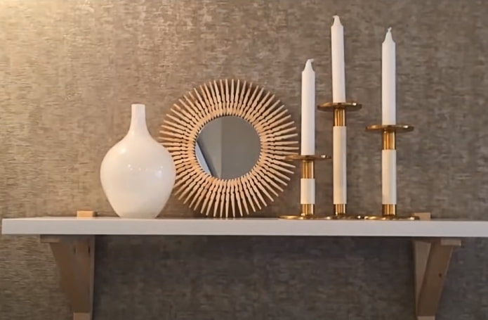 mirror in a frame made of clothespins