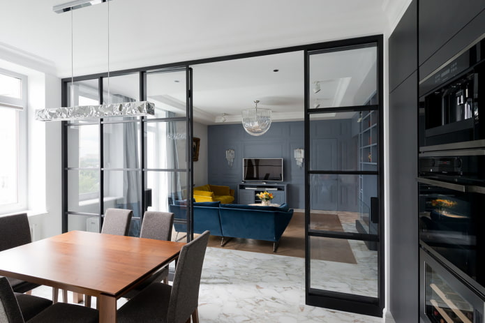 glass partition in the interior of the kitchen-living room