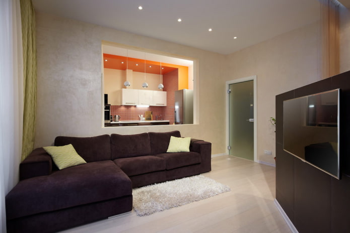 partition with a window in the interior of the kitchen-living room