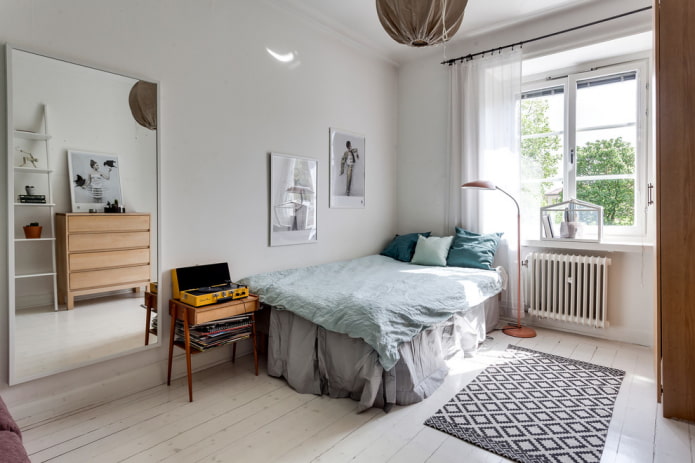 Floor lamp next to the bed