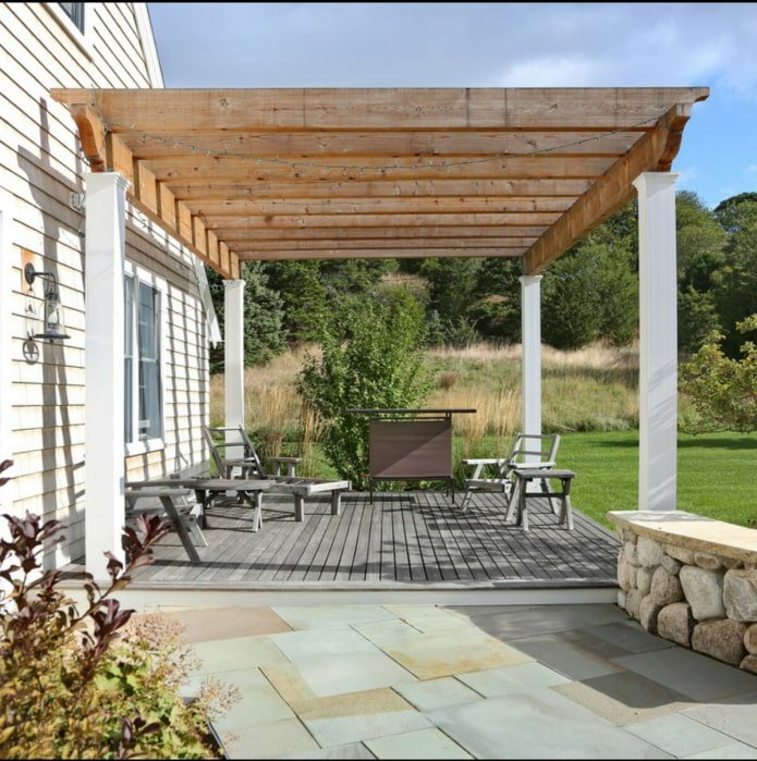 chaise lounges near the house