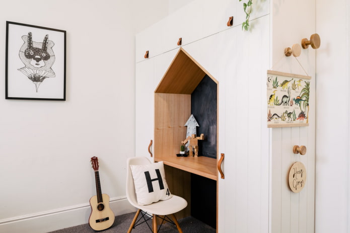 a desk built into furniture in the interior