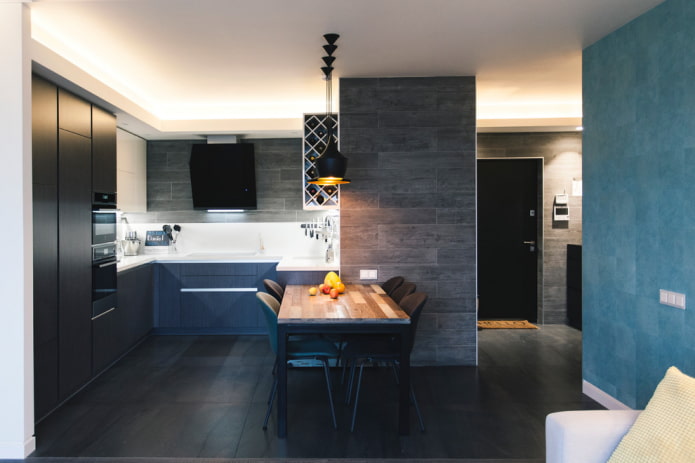 black floor tiles in the kitchen interior