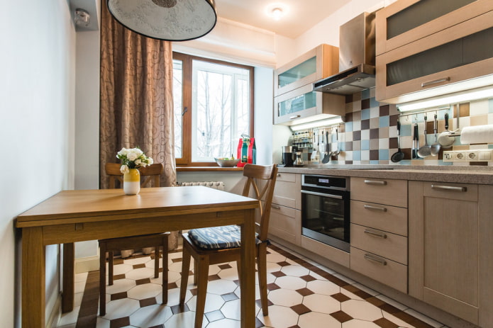 square floor tiles in the kitchen interior