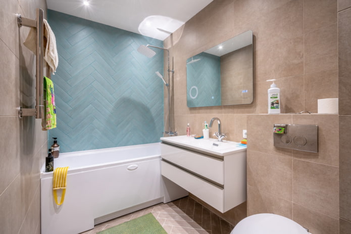 Large beige tiles and diagonal turquoise