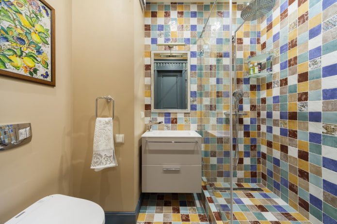 tiled shower and beige painted wall