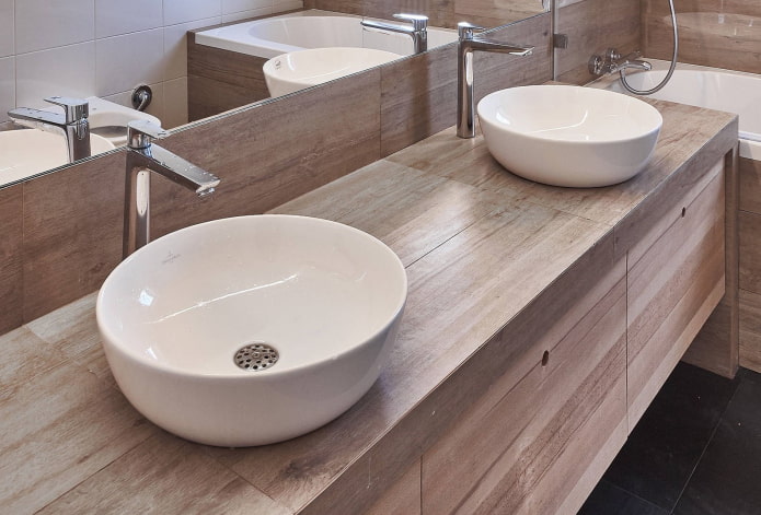 countertop with wood-effect tiles in a bathroom interior