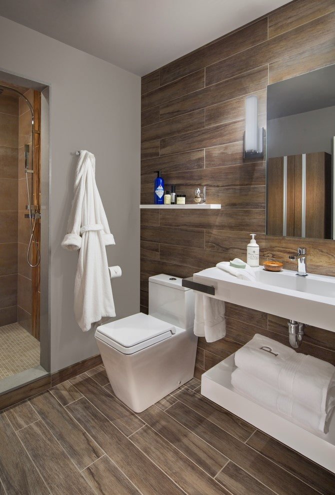 wood-like tiles in the bathroom interior