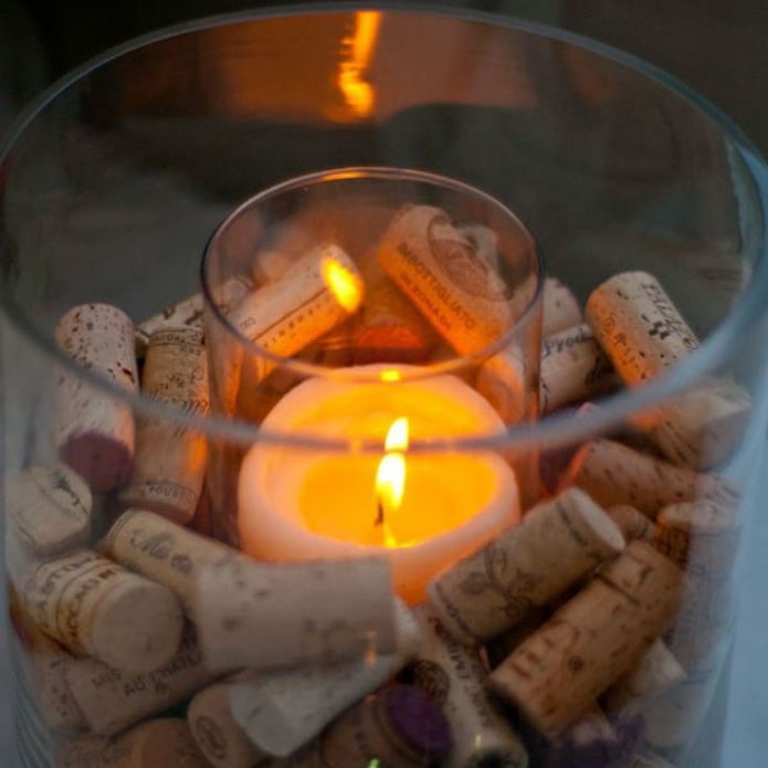 glass candlestick with corks