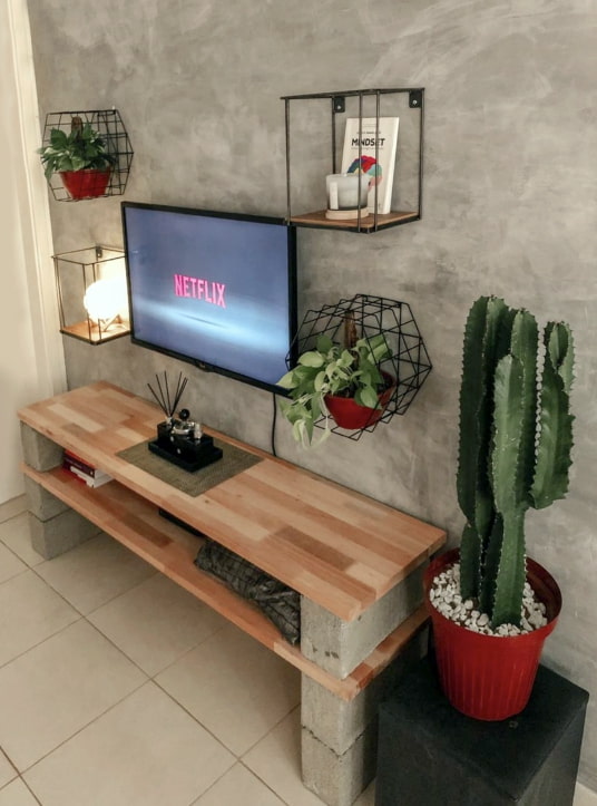 Stand made of boards and cinder blocks
