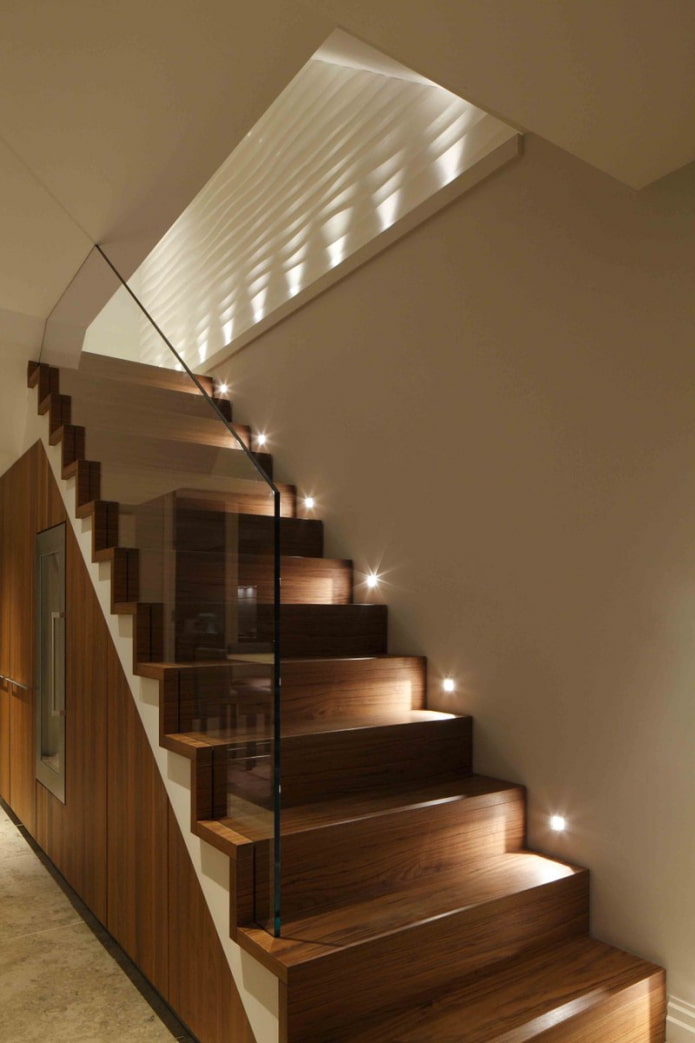 stairs with spot lighting in the house