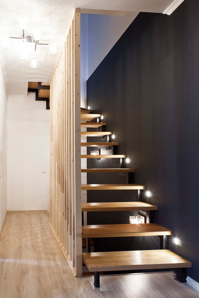 stairs with spot lighting in the house