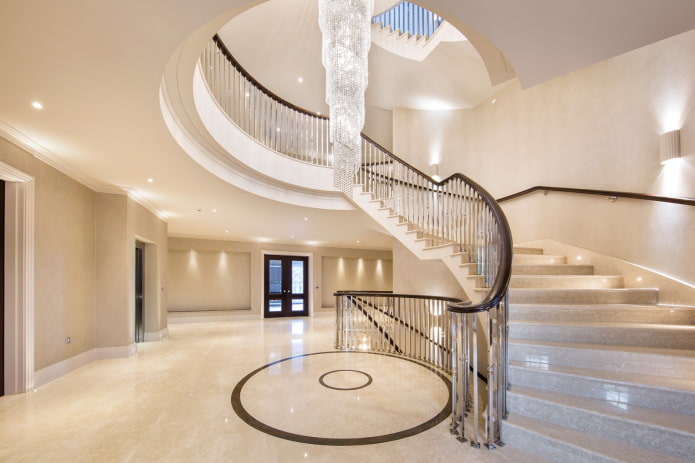 chandelier above the stairs in the interior of the house