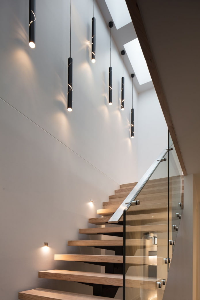 stairs with combined lighting in the house
