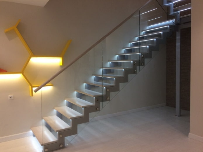 backlit metal staircase in the interior of the house