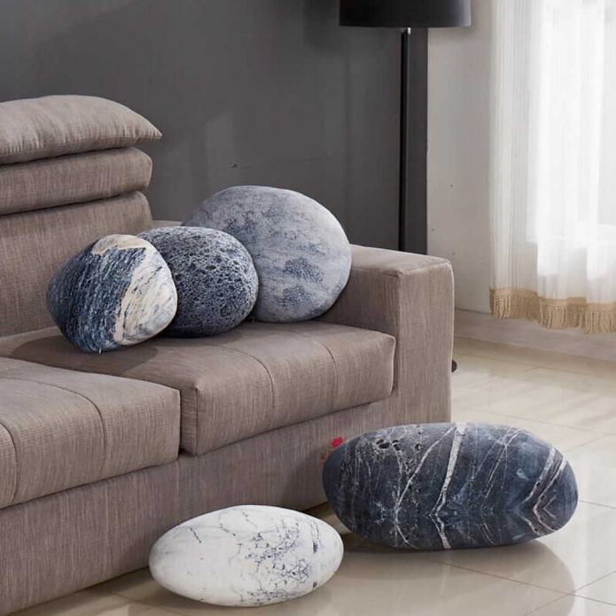 unusual pillow in the shape of a stone