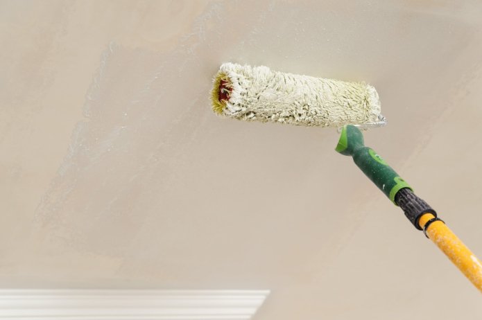 Painting the ceiling with a roller