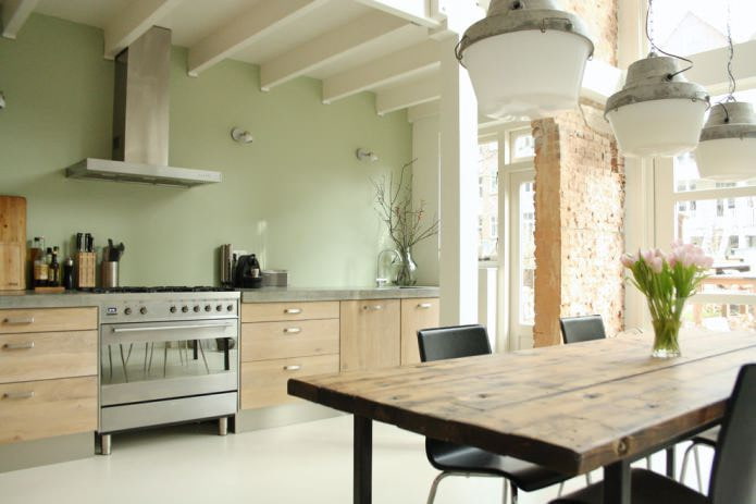 eco-kitchen with olive walls and a brick partition