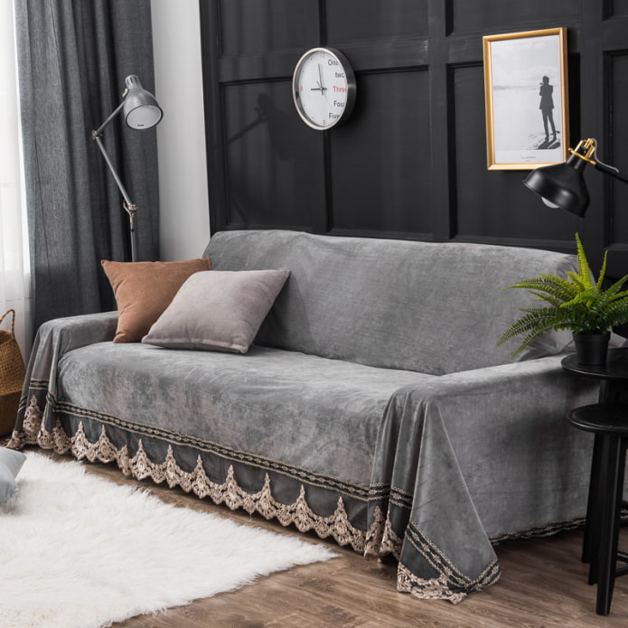 gray bedspread for a sofa in the interior