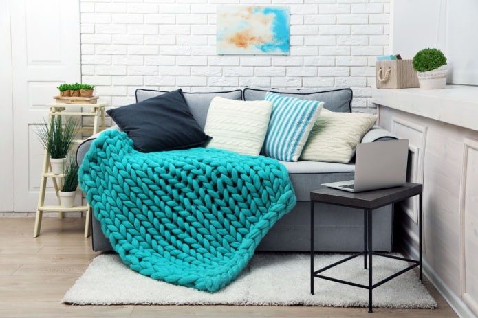 knitted bedspread for a sofa in the interior