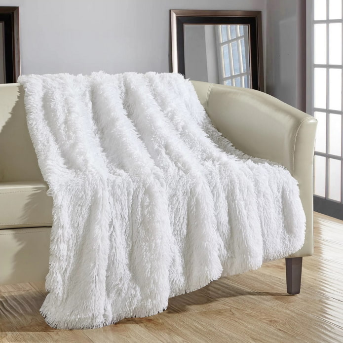 fluffy bedspread for a sofa in the interior