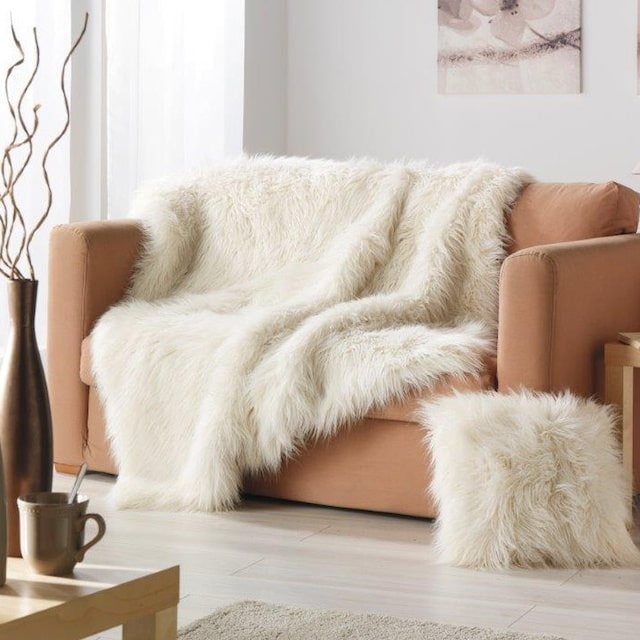 fluffy bedspread for a sofa in the interior