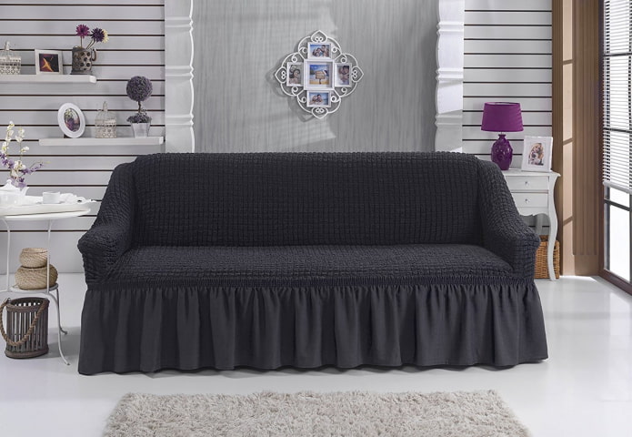 sofa cover with frills in interior